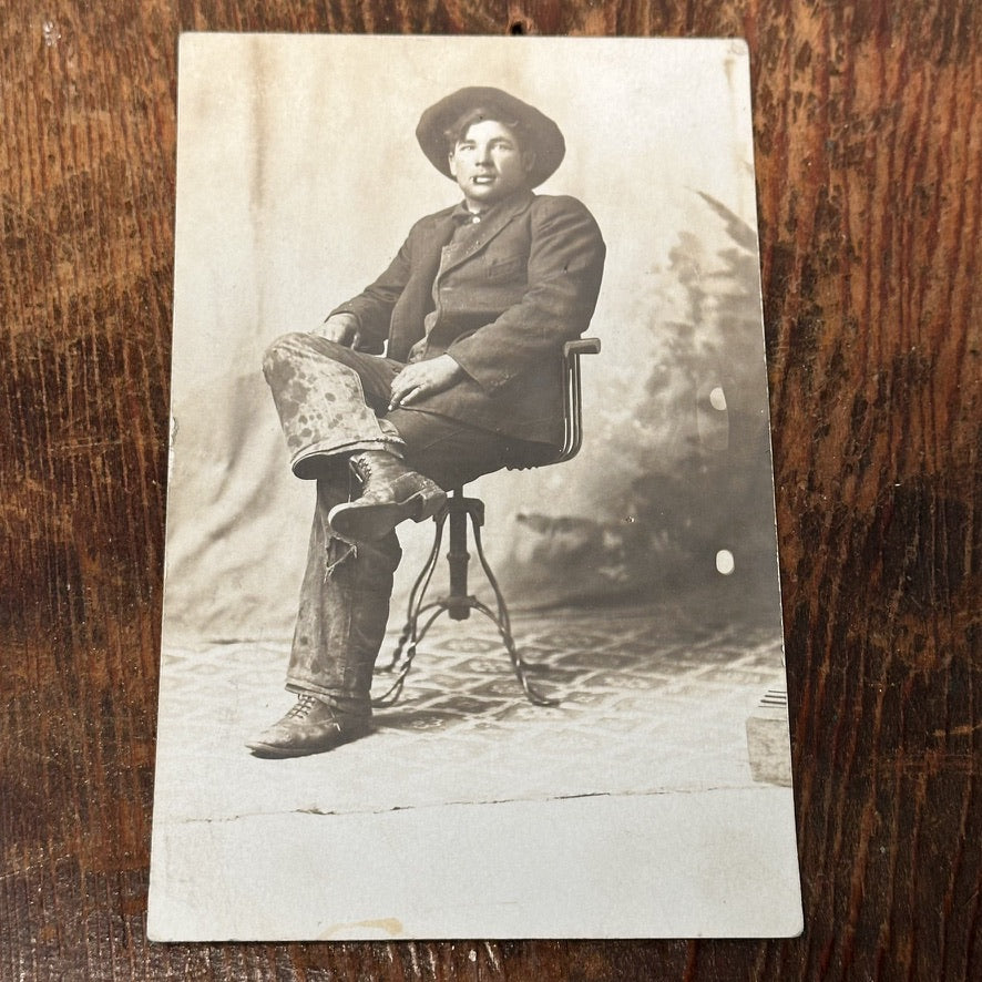 Antique RPPC of Occupational Worker with Cigar and Dirty Pants