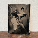 Antique Tintype of Man With Back to Camera in Group Portrait