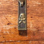 Antique Brass Crucifix with Smiling Skull and Crossbones | Early 1900s