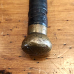 Brass Top of an Antique Leather Cane