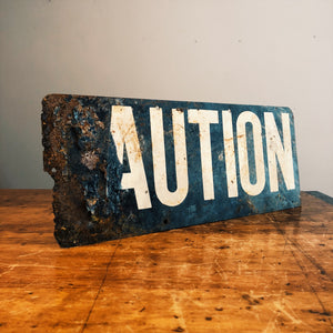 Corrosion on the Vintage Caution Railroad Sign