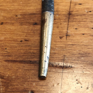 Brass Ferrule of an Antique Leather Cane