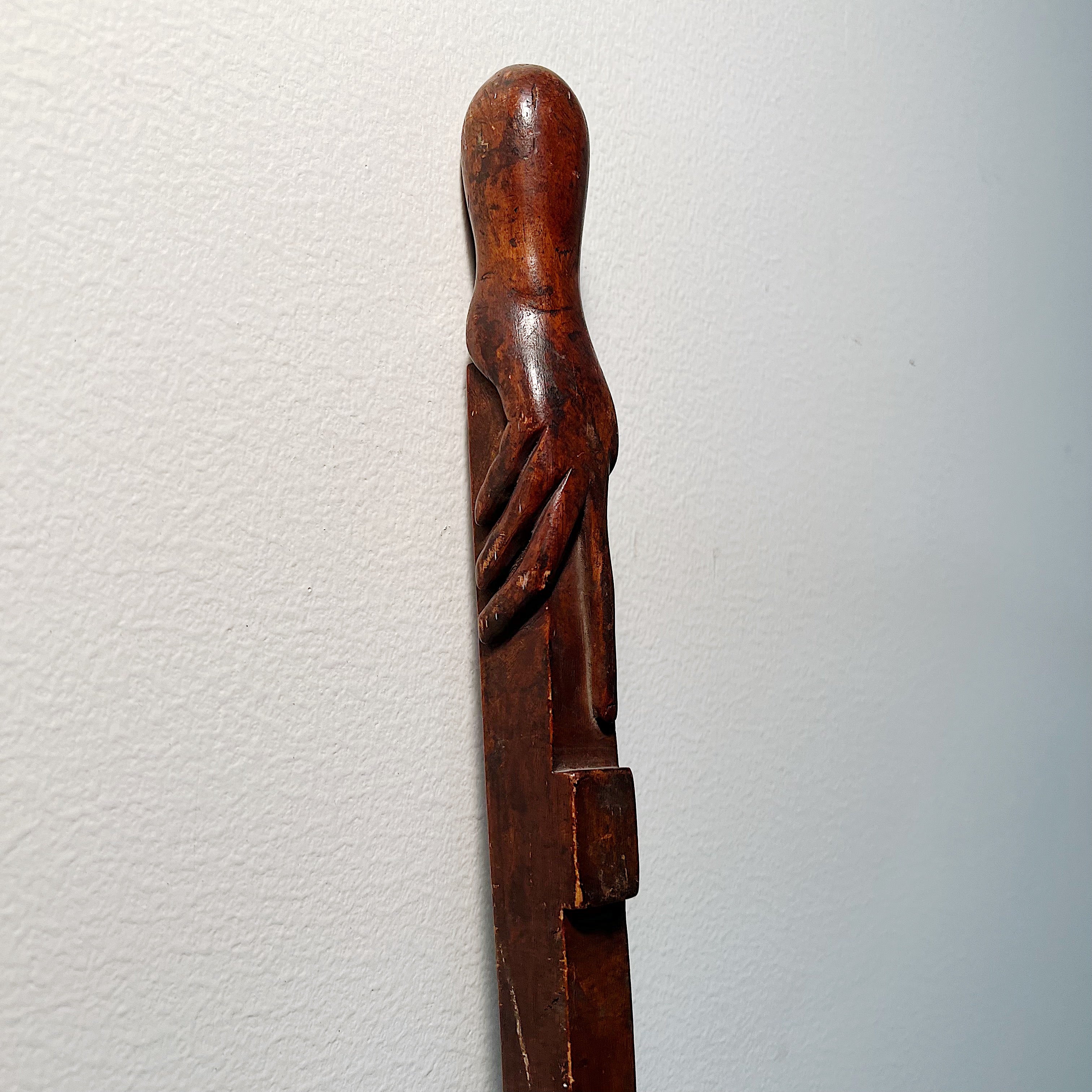 Antique Folk Art Walking Cane of Hand Holding the Handle