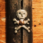Skull and Crossbones on Primitive Cross