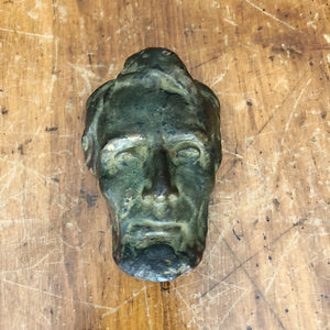 Natural light view of Antique Abraham Lincoln Bronze Resin Bust 